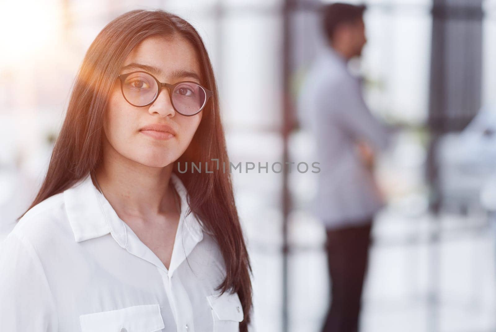 Young student or teacher looking at camera by Prosto
