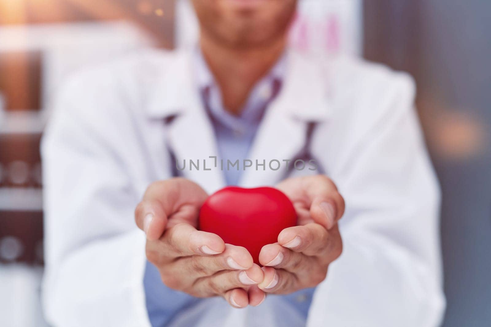 abstract background of hands holding heart model