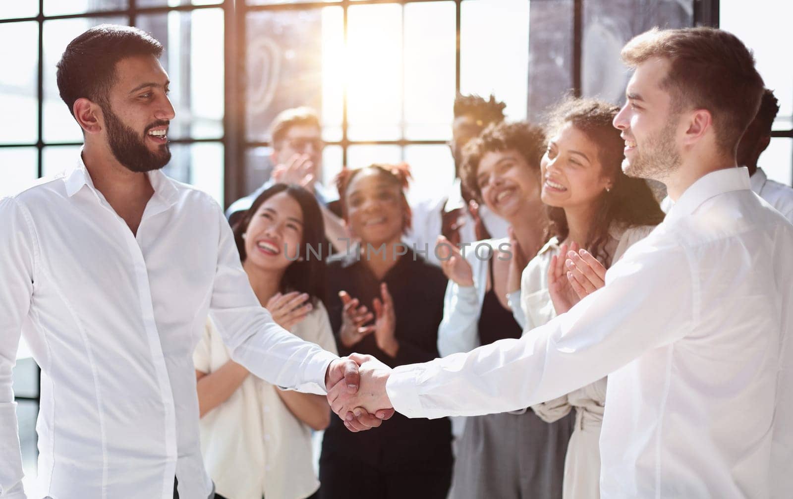 Business people shaking hands, finishing up a meeting