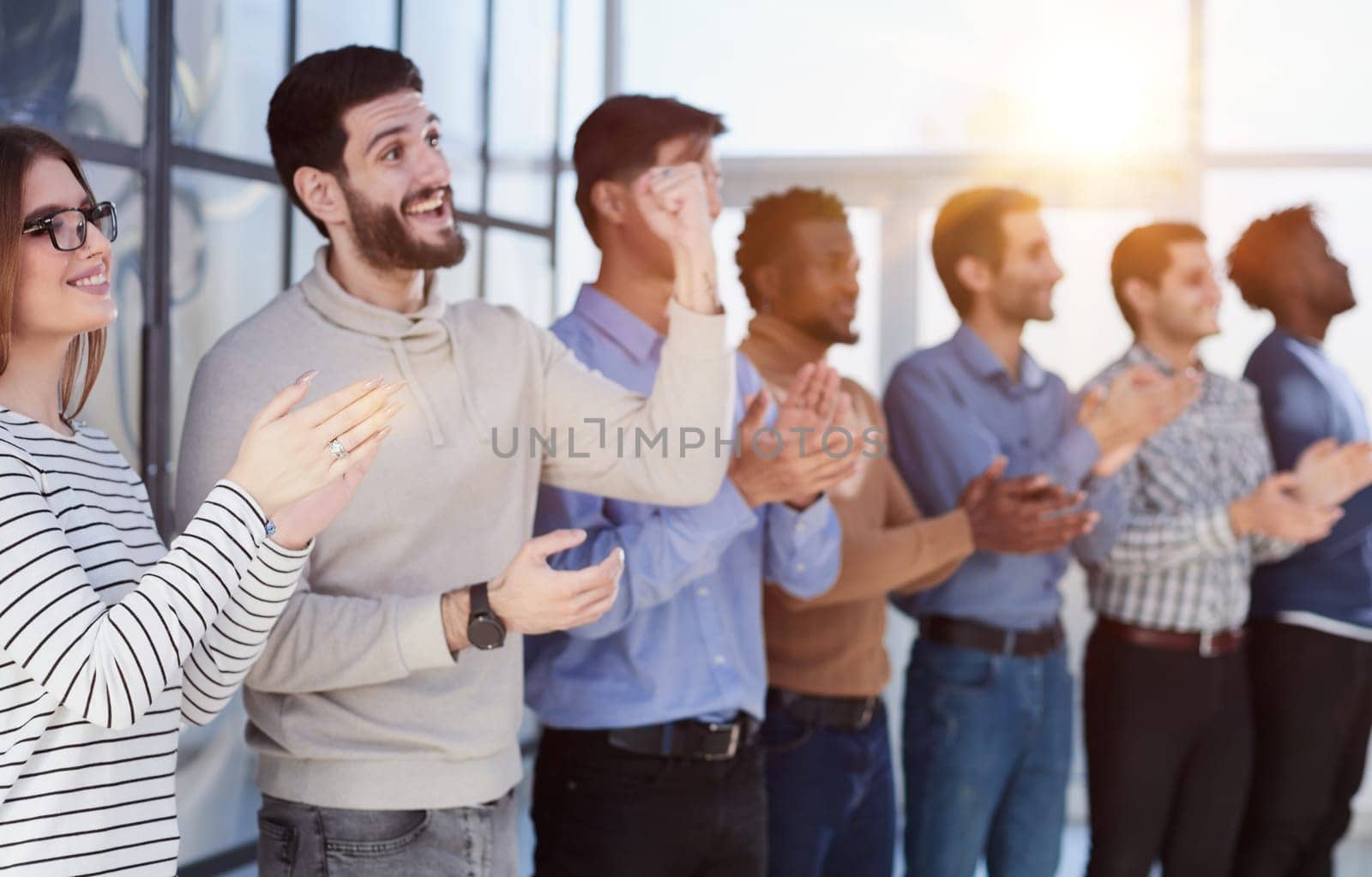 Close up side profile, different participants business people stand and express appreciation by clapping their hands by Prosto