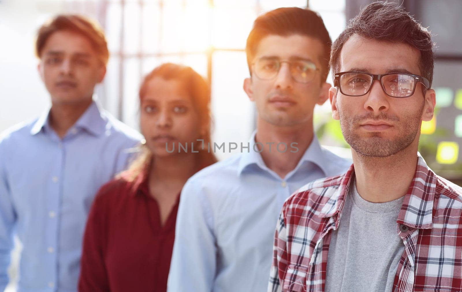 young professional employees company staff with executive leader look at camera.