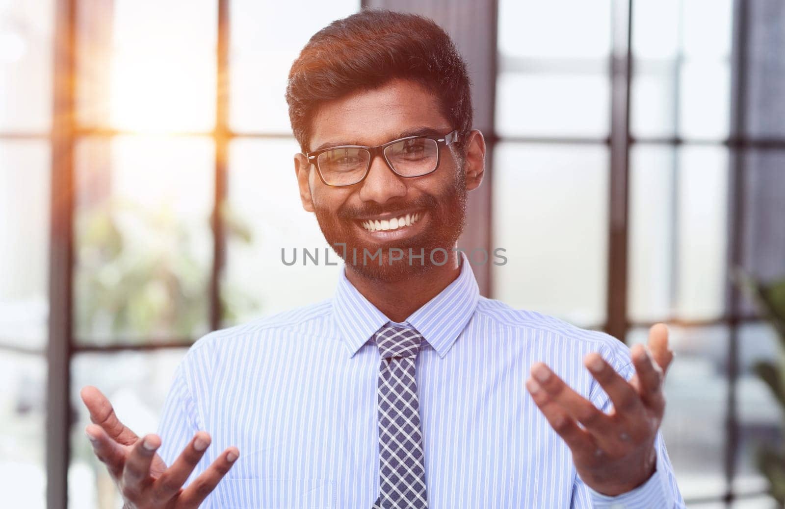 Successful businessman looking at camera with confidence