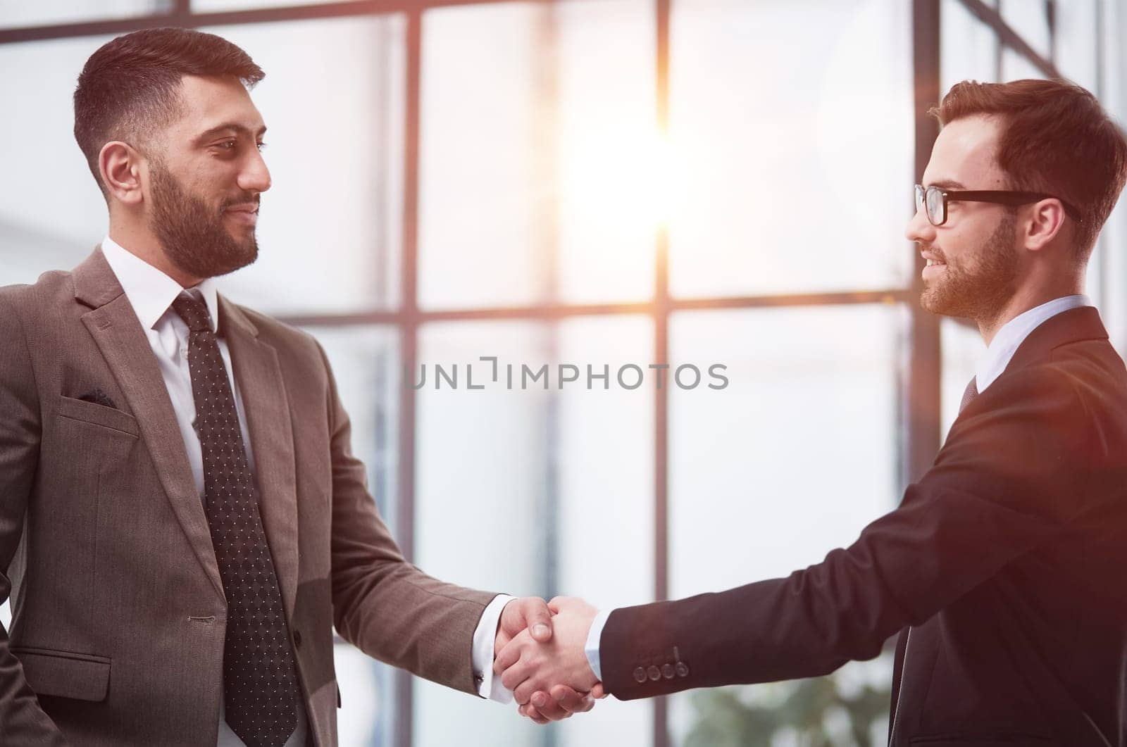 business background.handshake business men in the business center