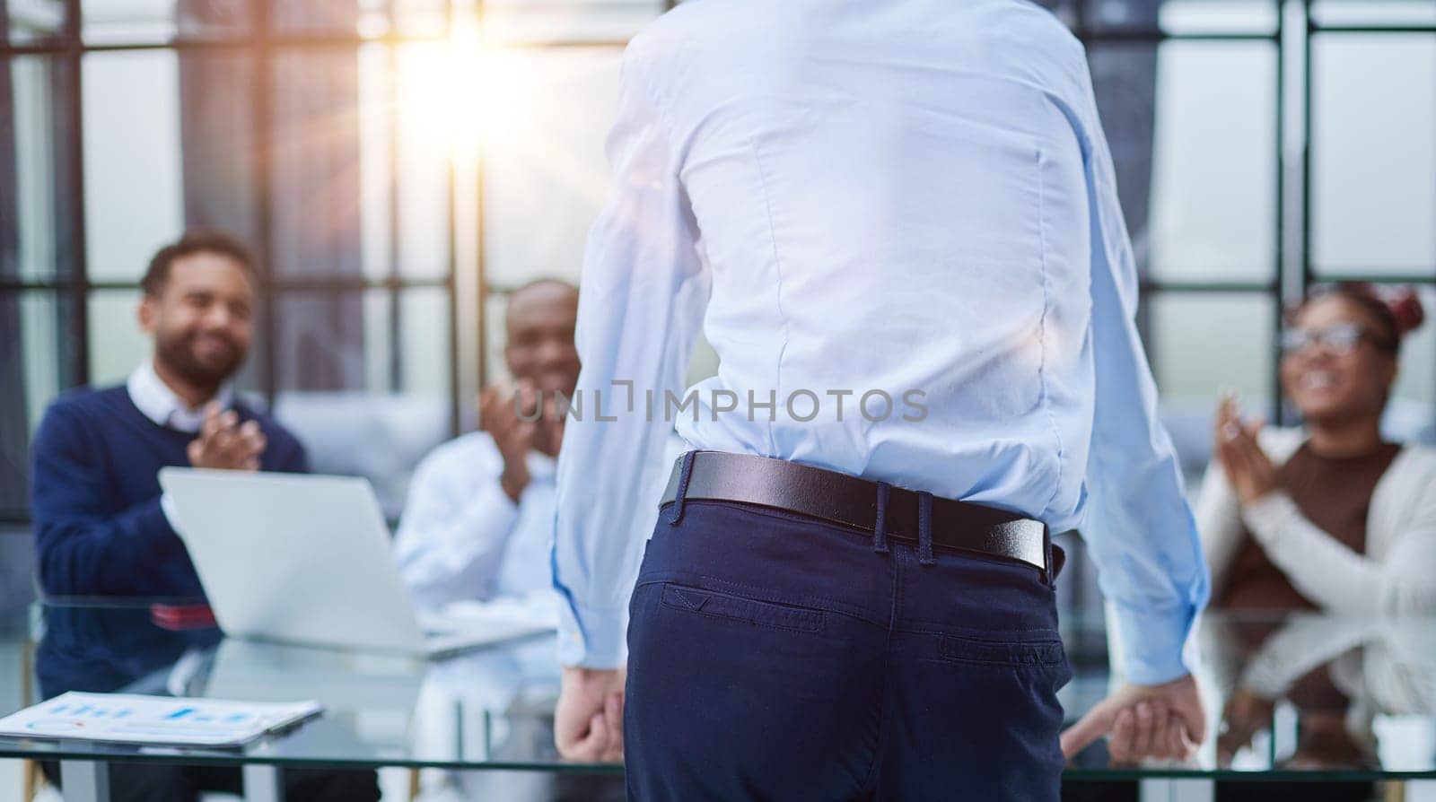 Young employee asking for advice from his helpful experienced colleagues in the office by Prosto