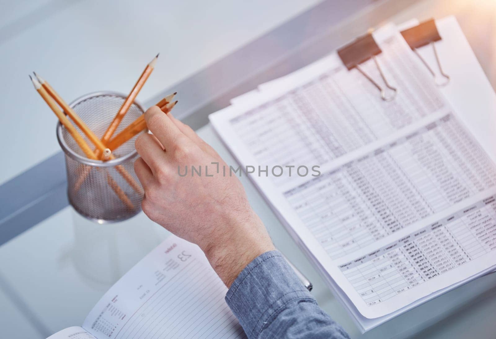 businessman reviewing document reports at office workplace.