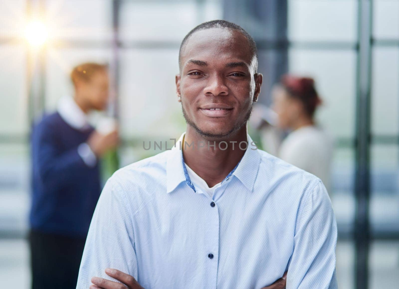 Young handsome african american man in casual shirt standing