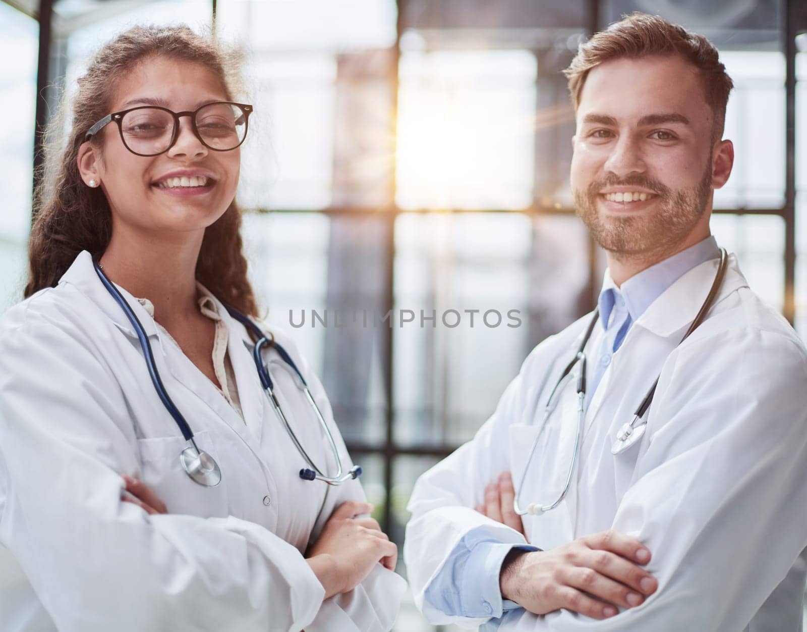 portrait of two medical workers in the hospital looking at the camera