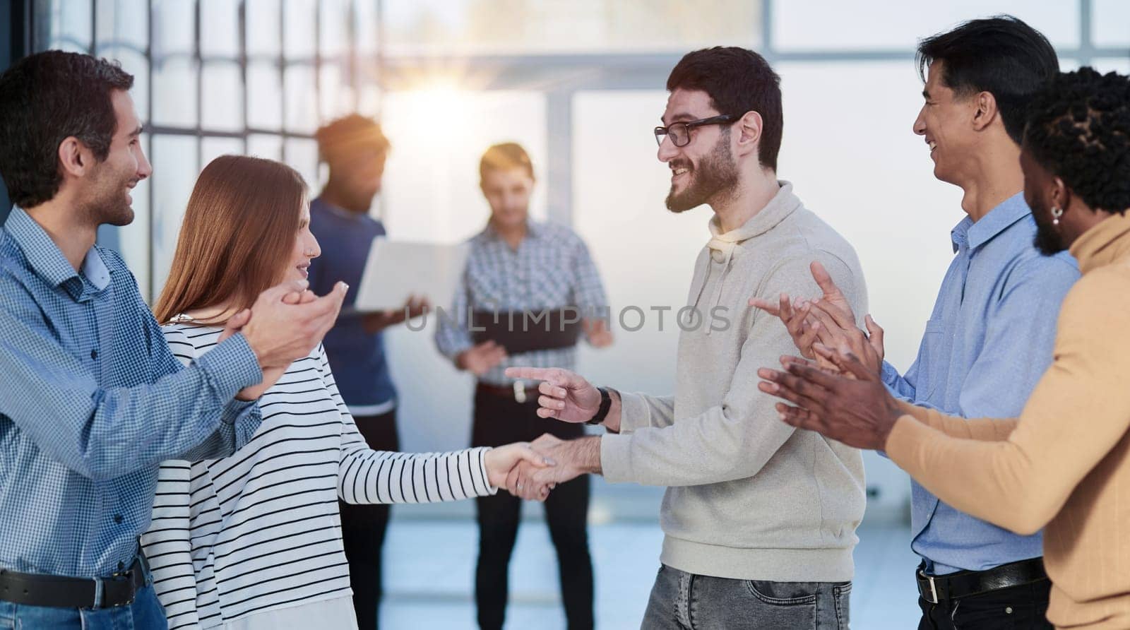 Business people stand and work in an office building