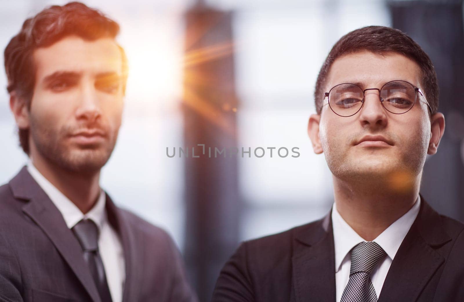 Two men business workers standing with arms crossed gesture at office
