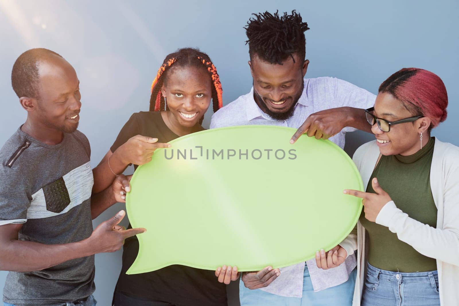 Young african american friends holding up copyspace placard thought bubbles by Prosto