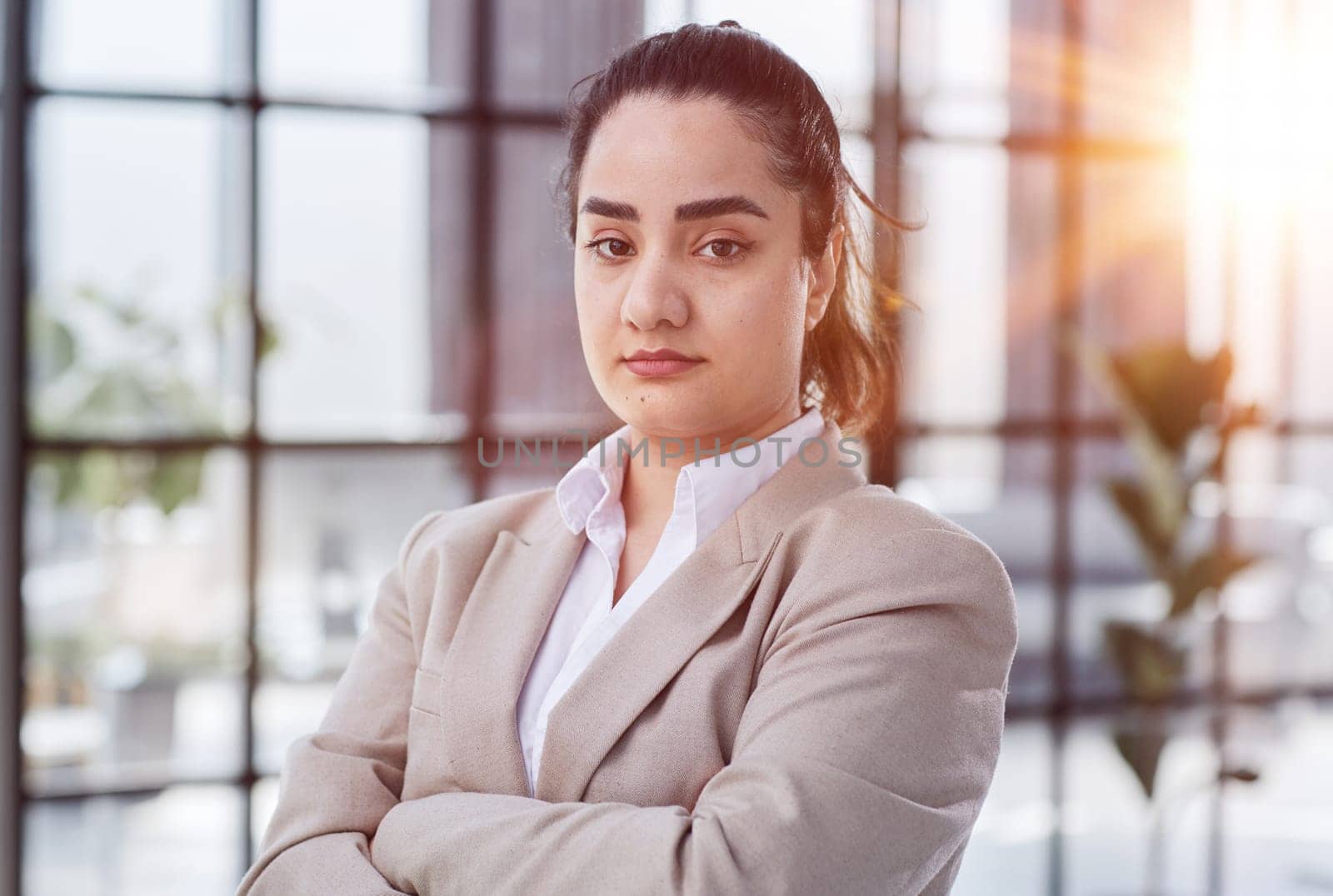 Portrait of girl leader or manager at a team planning, collaboration and strategy business meeting.