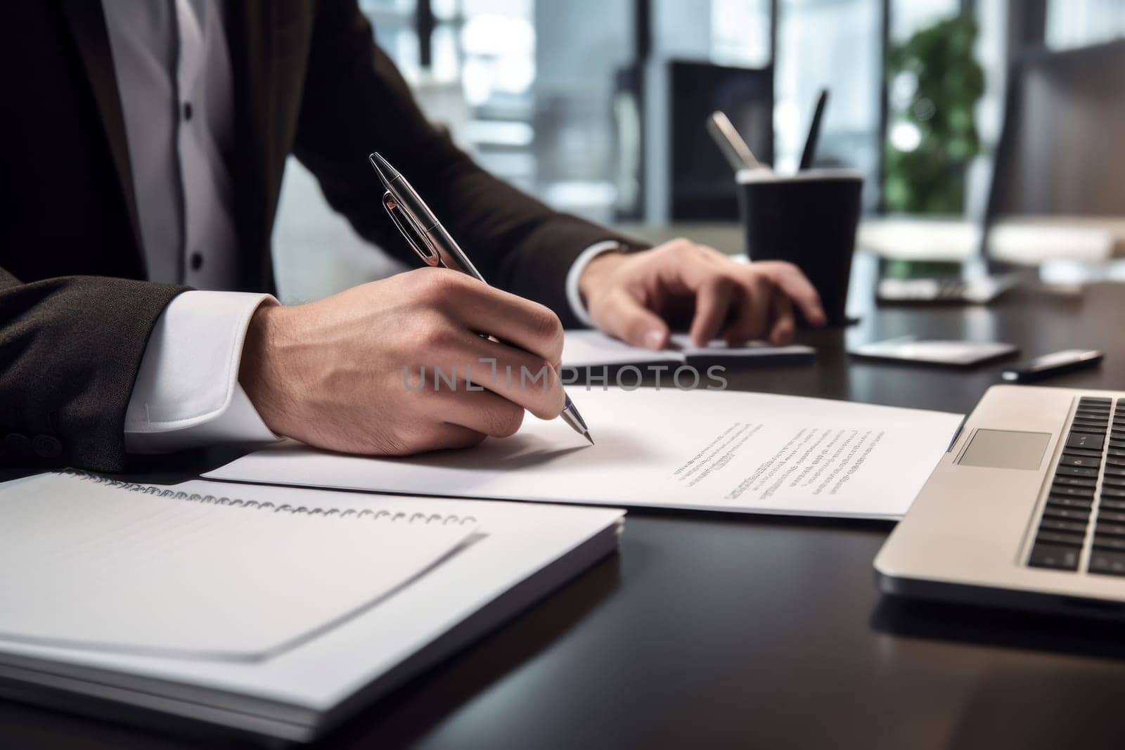 Businessman Signing documents In The Office.