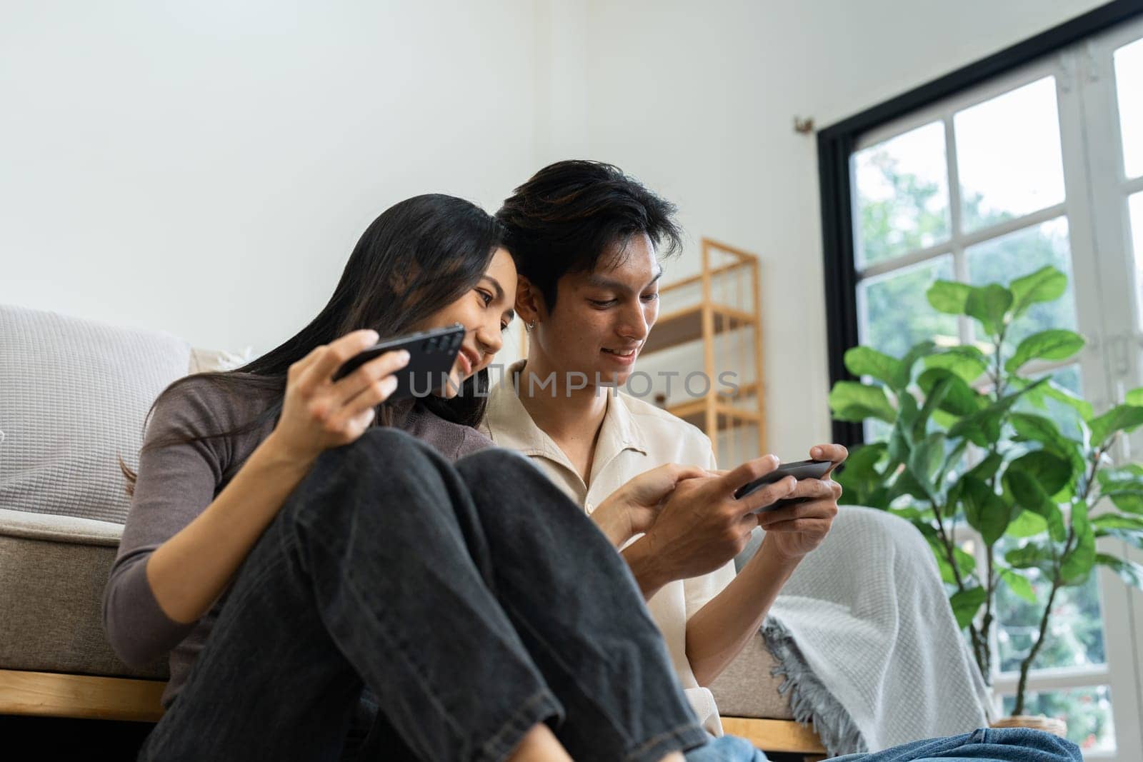 couple man and woman talking working spend time together at home, Asian couple lifestyle concept.