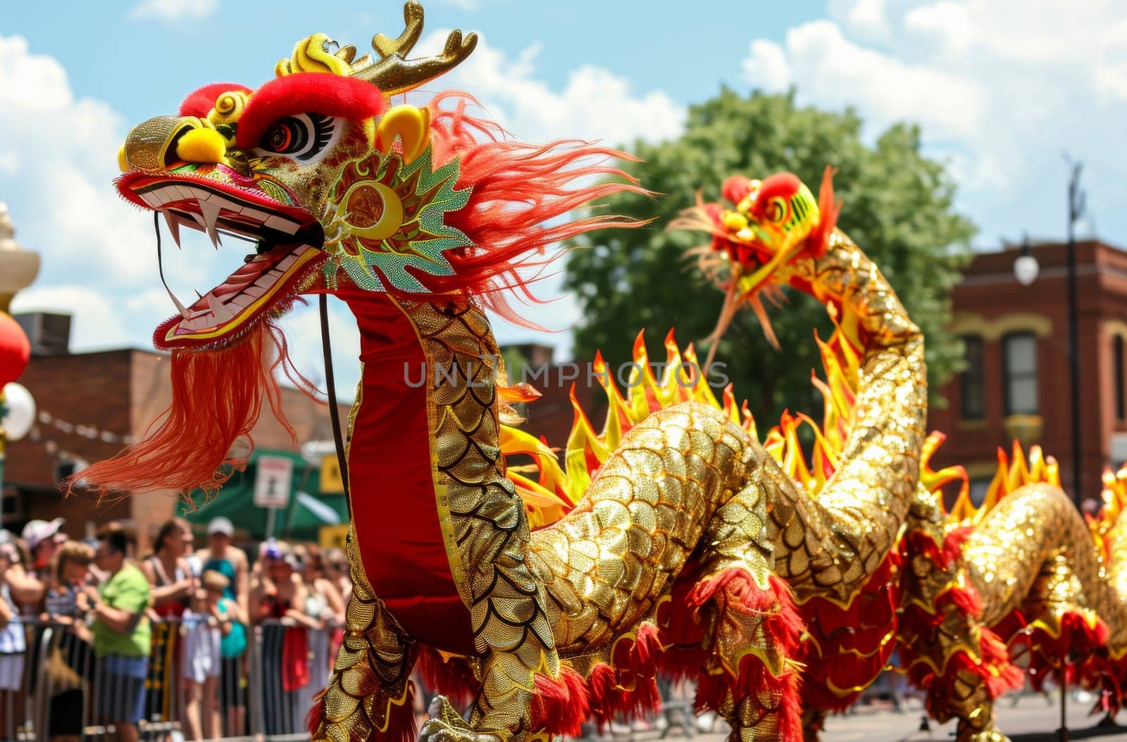 A golden dragon with vibrant red details captivates onlookers in a daylight parade, symbolizing cultural heritage with its elaborate design and dynamic movement