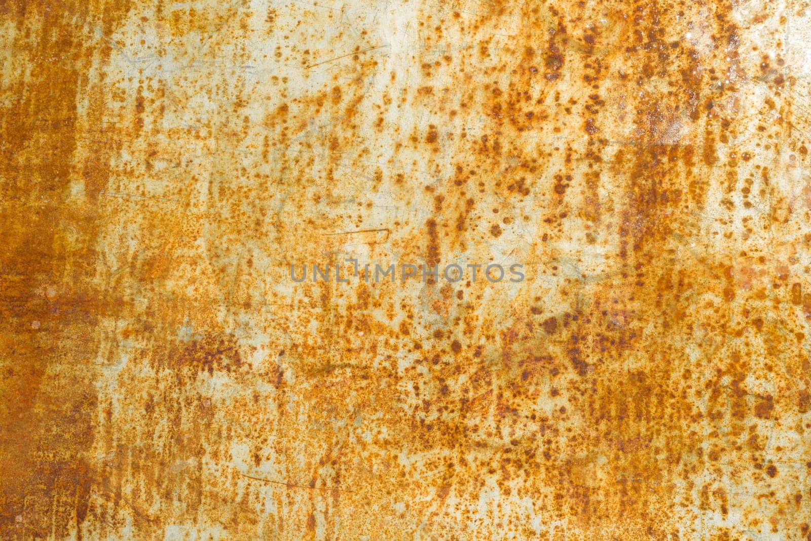 Abstract corroded rusty metal background texture, gray brown.