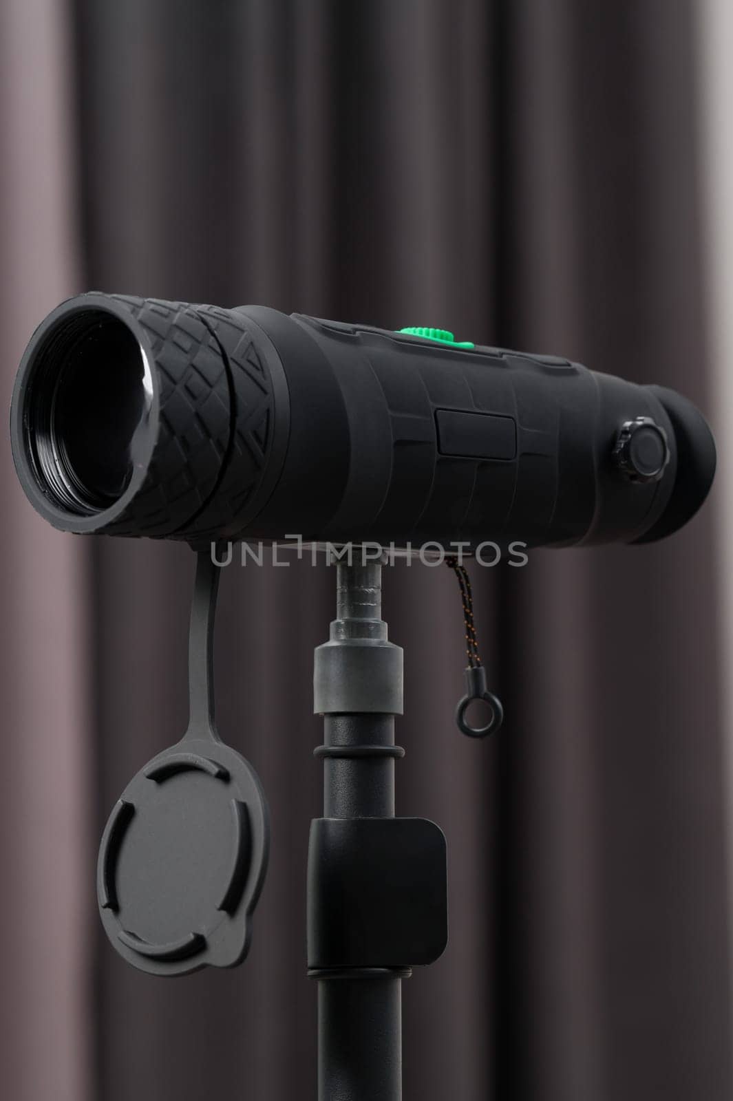 Long-range military monocular with rice protective case.