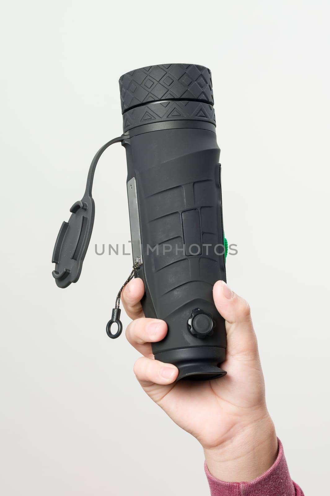 A child holds a monocular in his hand on a white background. by Niko_Cingaryuk