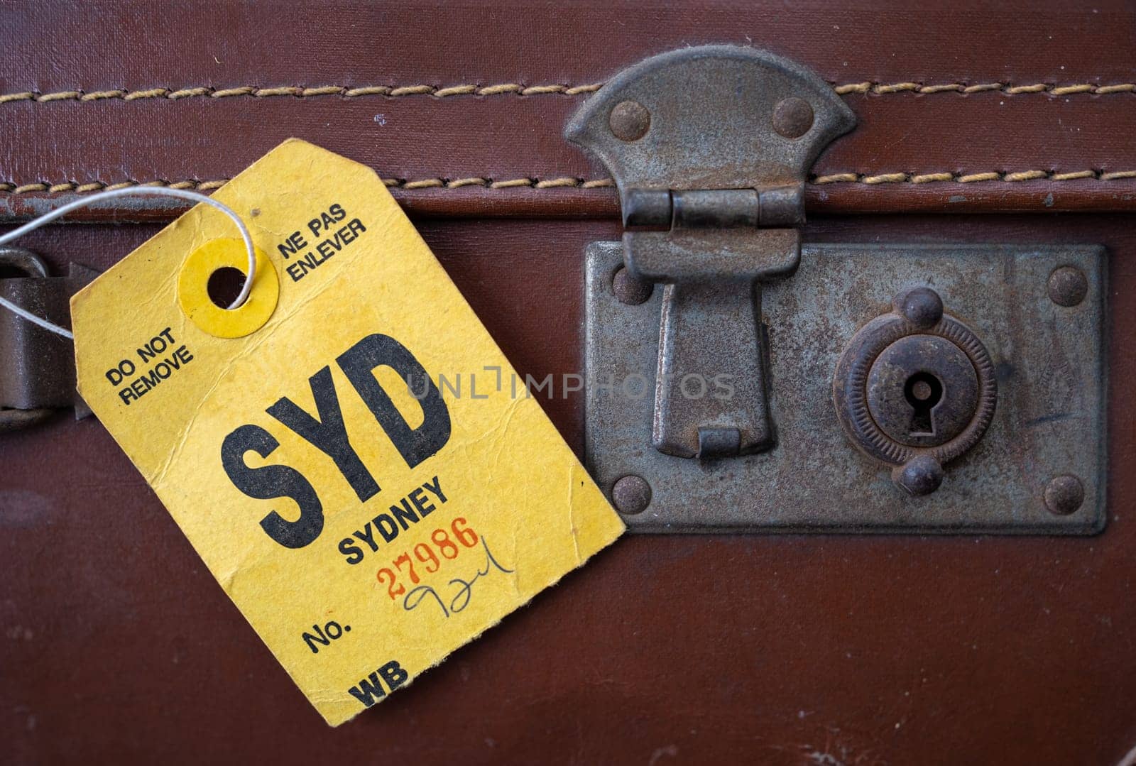 A Retro Luggage Tag On A Vintage Suitcase, For Sydney, Australia
