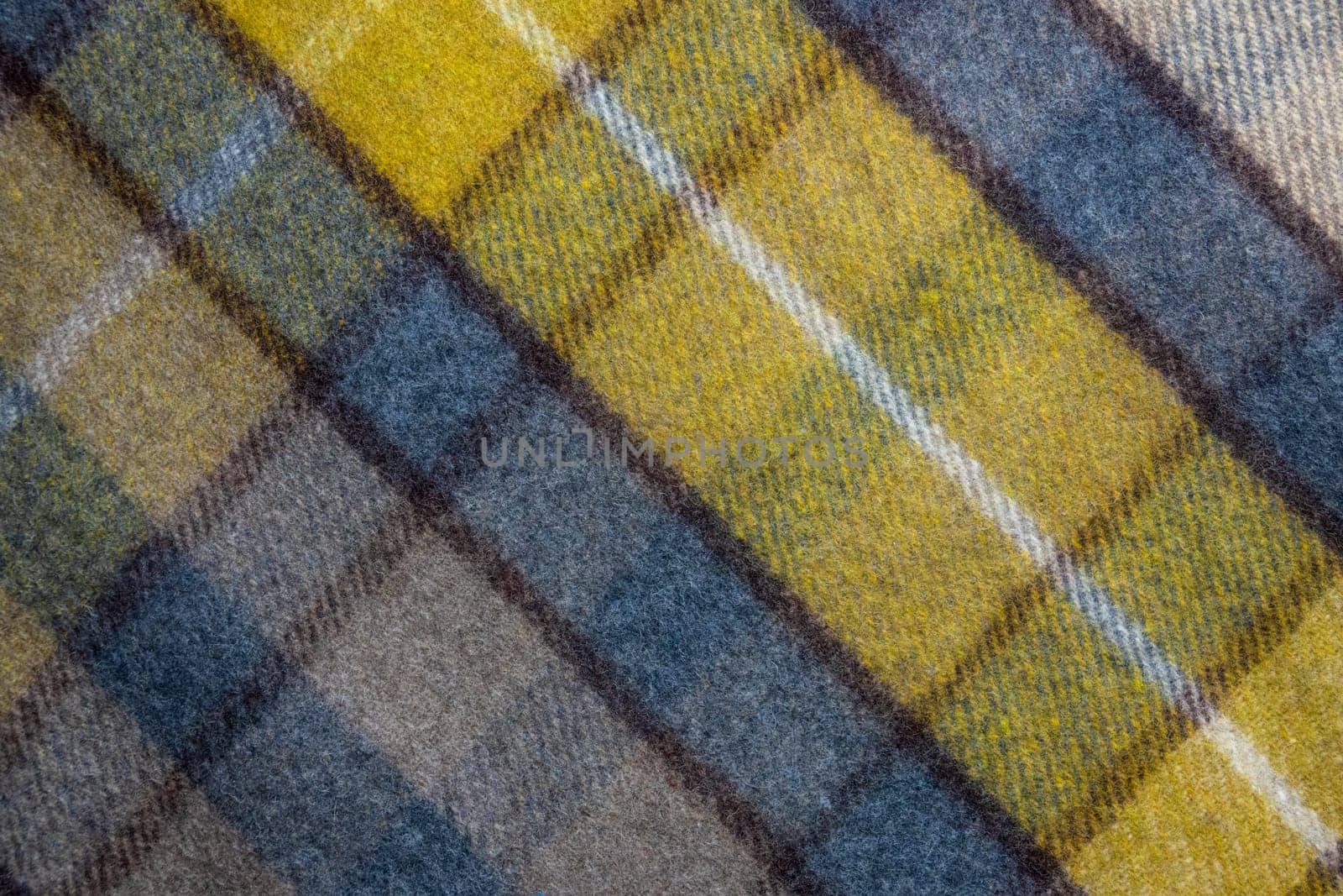 Background Texture Of A Woollen Tartan Plaid Blanket Or Shawl