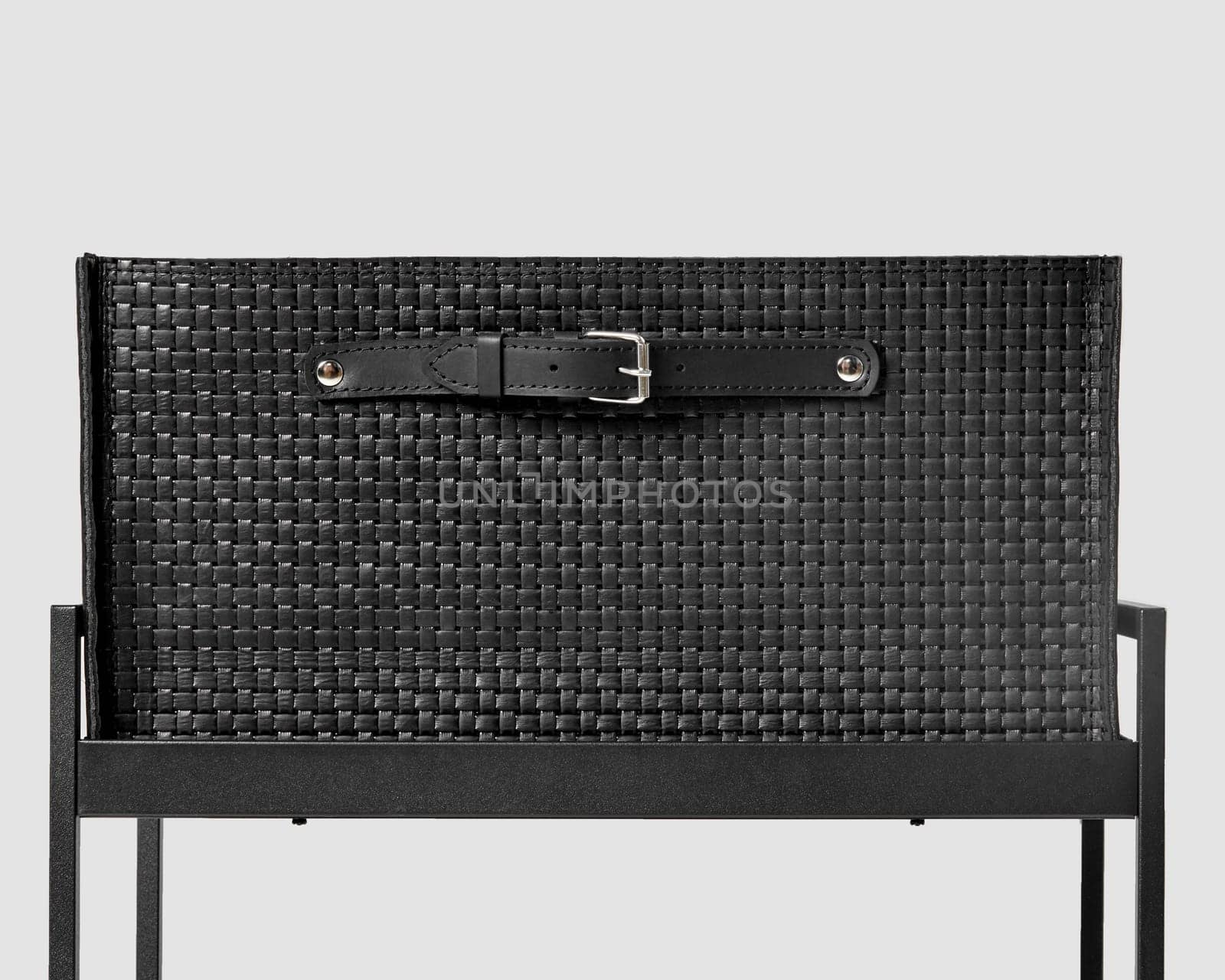 Black leather woven drawer with applied handle on metal shelving unit by nazarovsergey