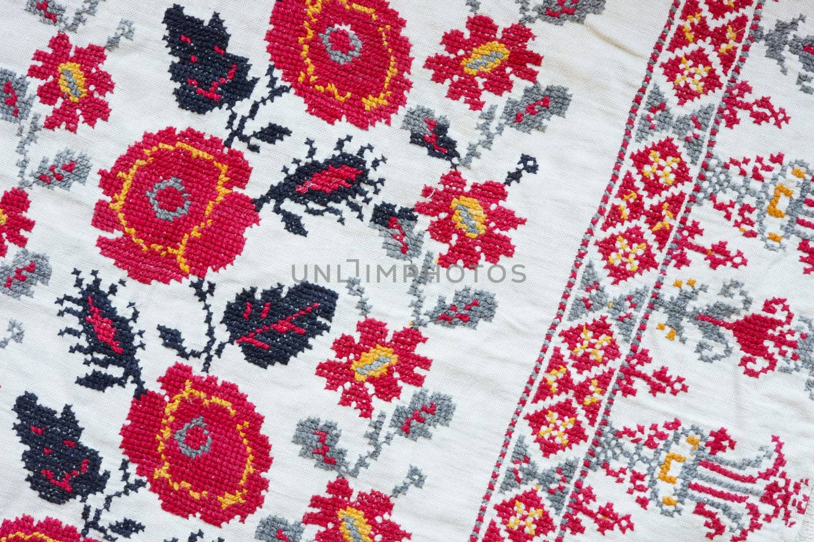 Close up of Ukrainian cultural embroidery with ethnic patterns.