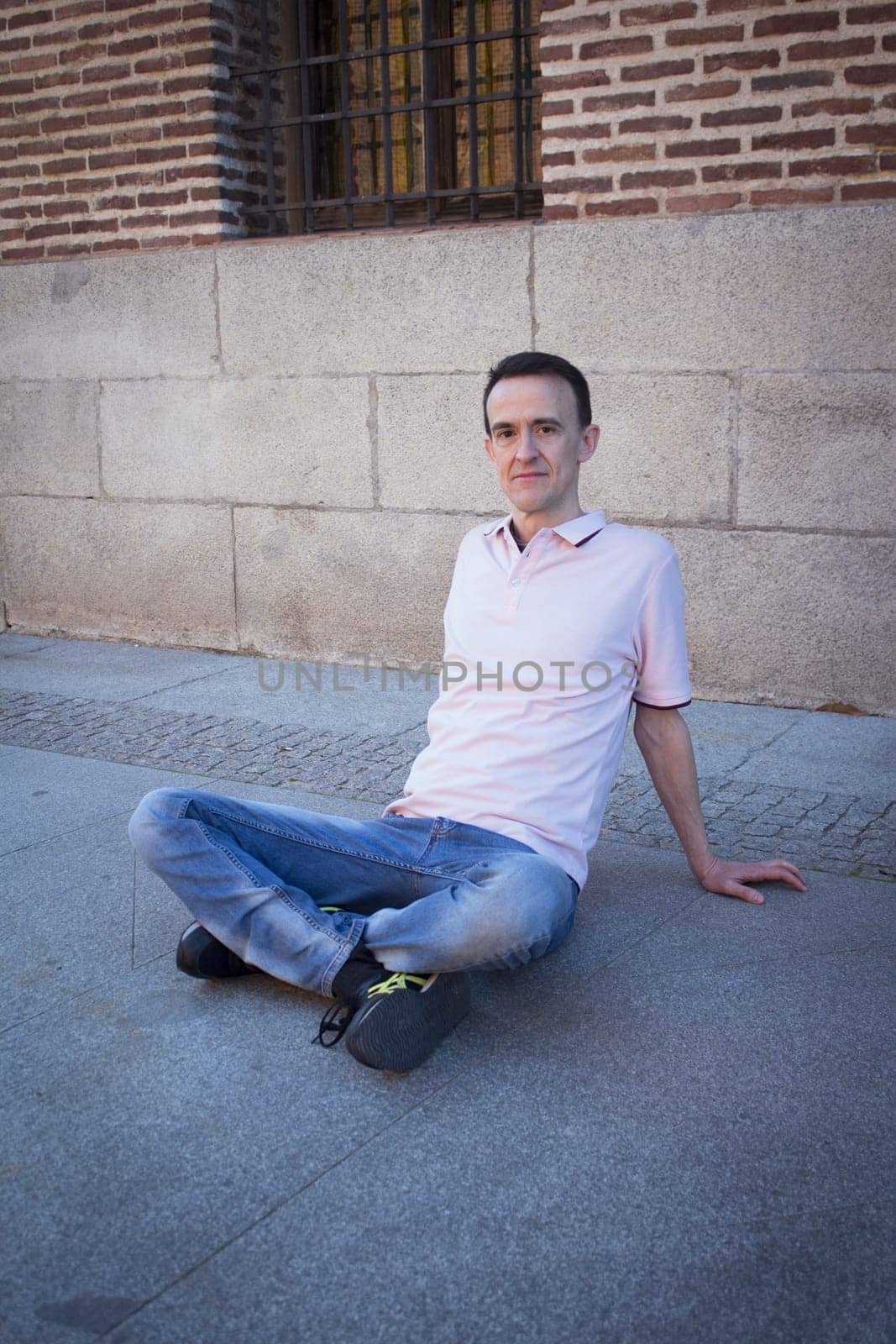 Jovial man in positive and calm attitude by GemaIbarra