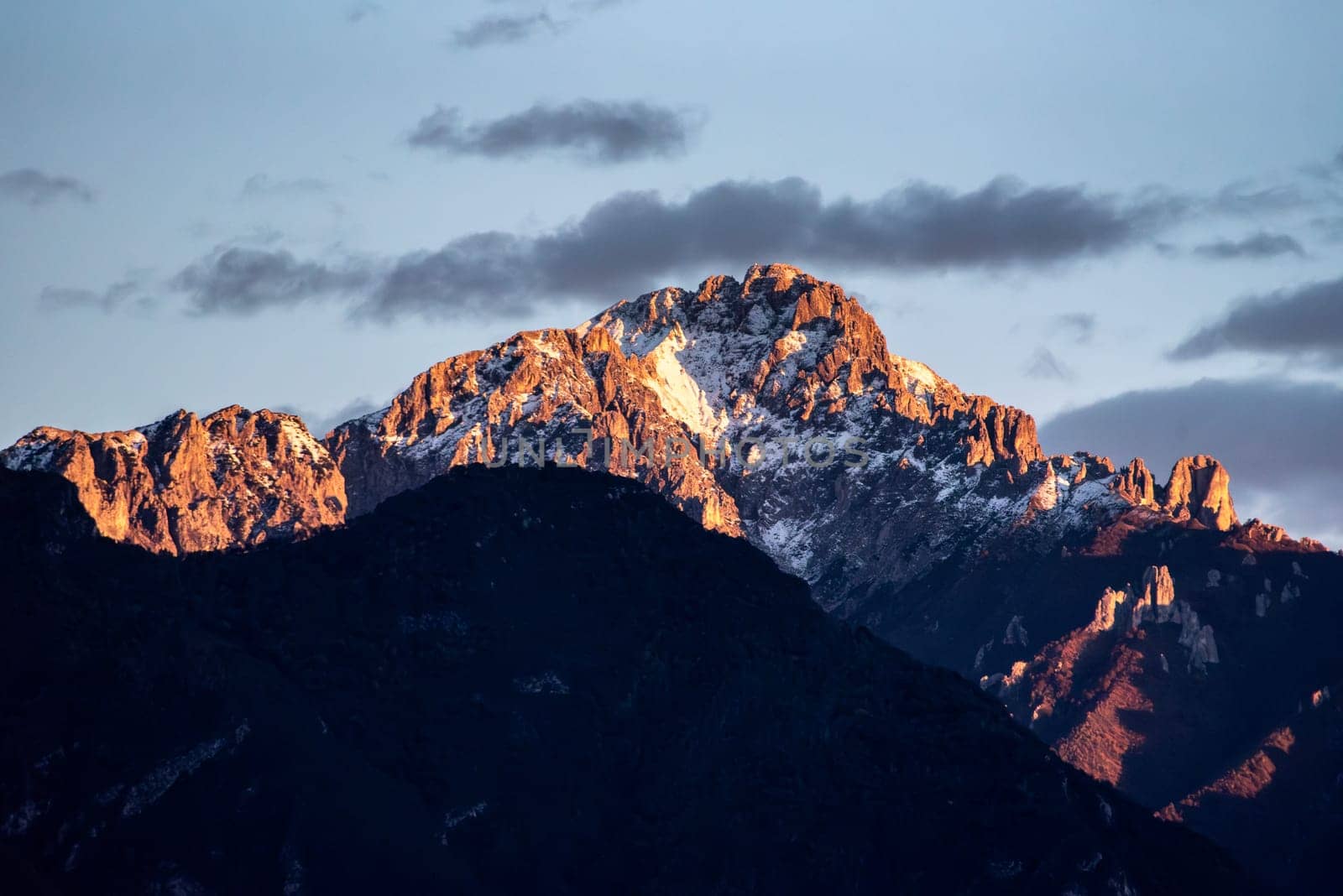 Sunset at snowcapped mount Grigna at lake Como, Italy
