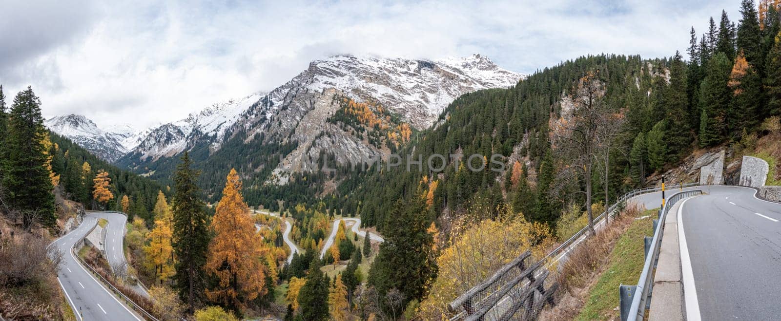 Scenic winding road at Maloja pass in autumn by imagoDens