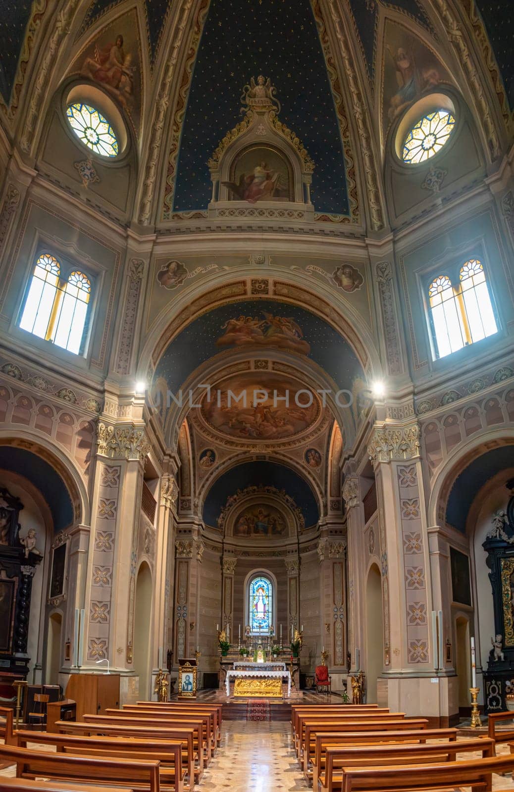 VARENNA, ITALY - OCTOBER 05, 2023 - Church San Lorenzo in Tremezzo at lake Como by imagoDens