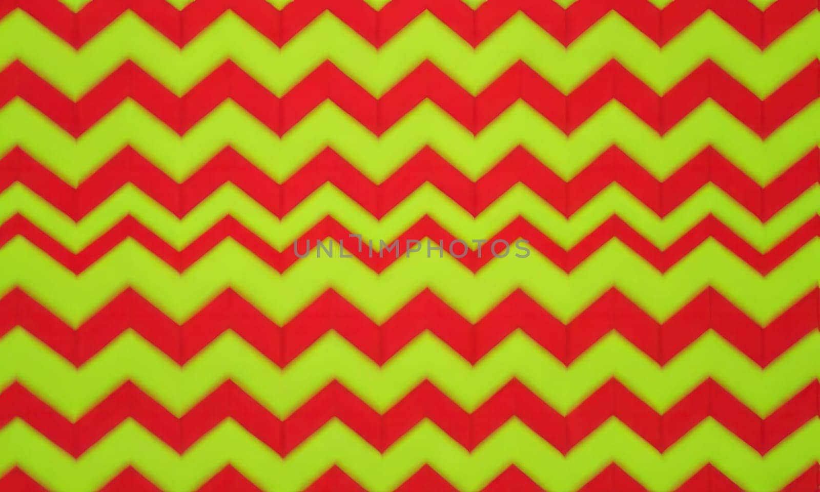 A gradient wallpaper with Chevron shapes using red and lime gradient colors. Generative AI.