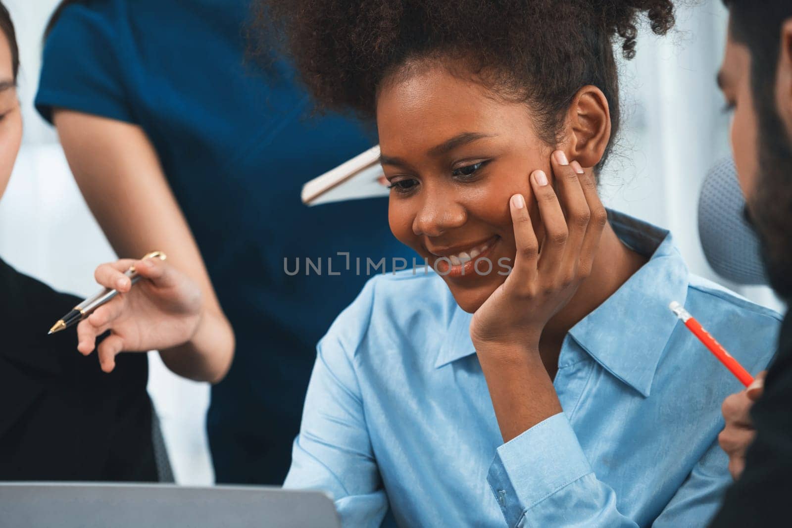 Happy diverse business people work together, discussing in corporate office. Professional and diversity teamwork discuss business plan on desk with laptop. Modern multicultural office worker. Concord