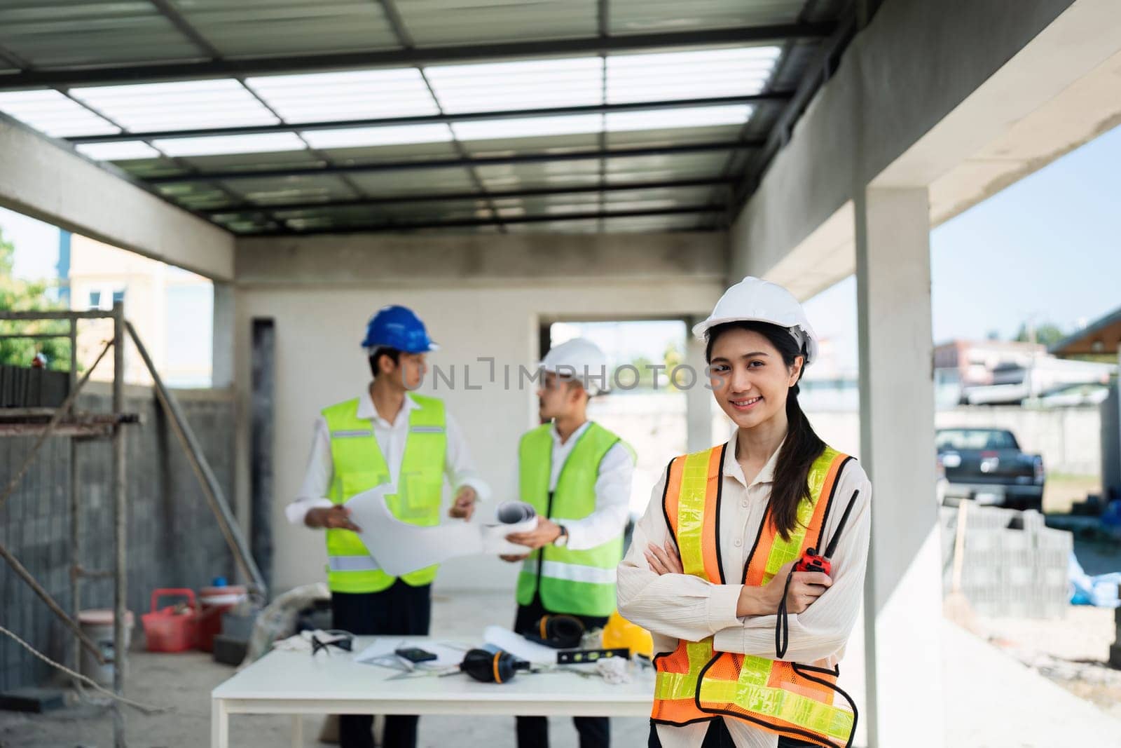 Portrait, construction worker and manager with an engineer woman at work in her architecture office by itchaznong