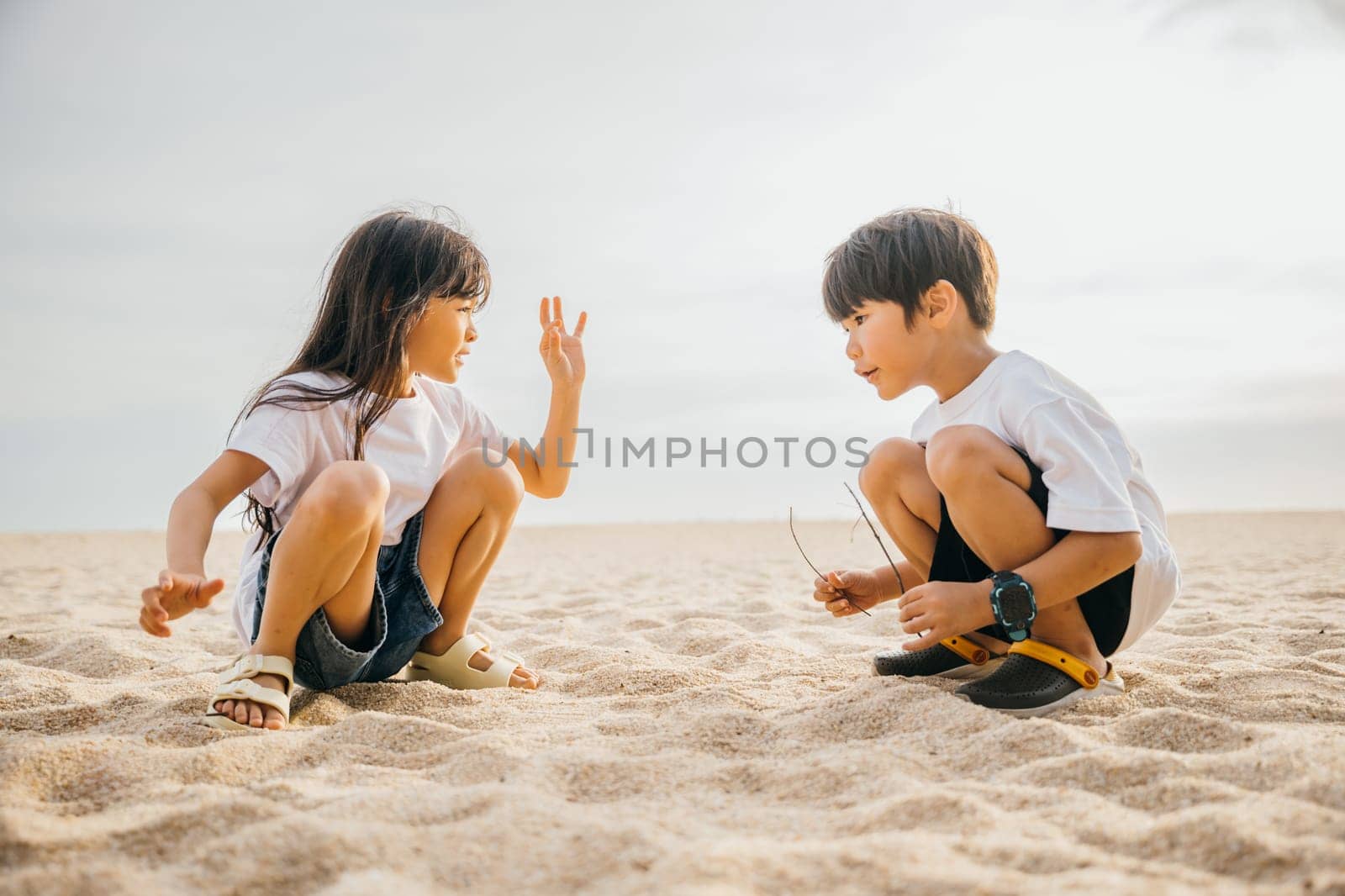 Children boy and girl having a blast on the beach playing with sand under the sunny sky. Family joy laughter and carefree moments captured in this delightful vacation concept. by Sorapop