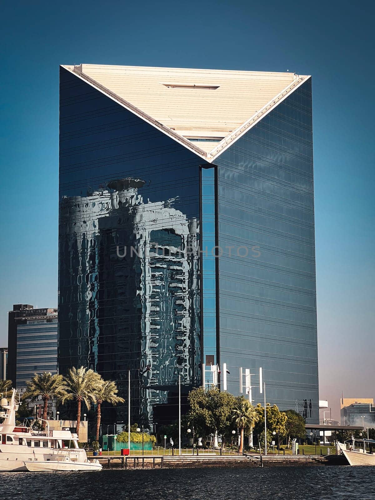 DUBAI CREEK, UAE, the Chamber of Commerce building and waterfront, 91 m in height