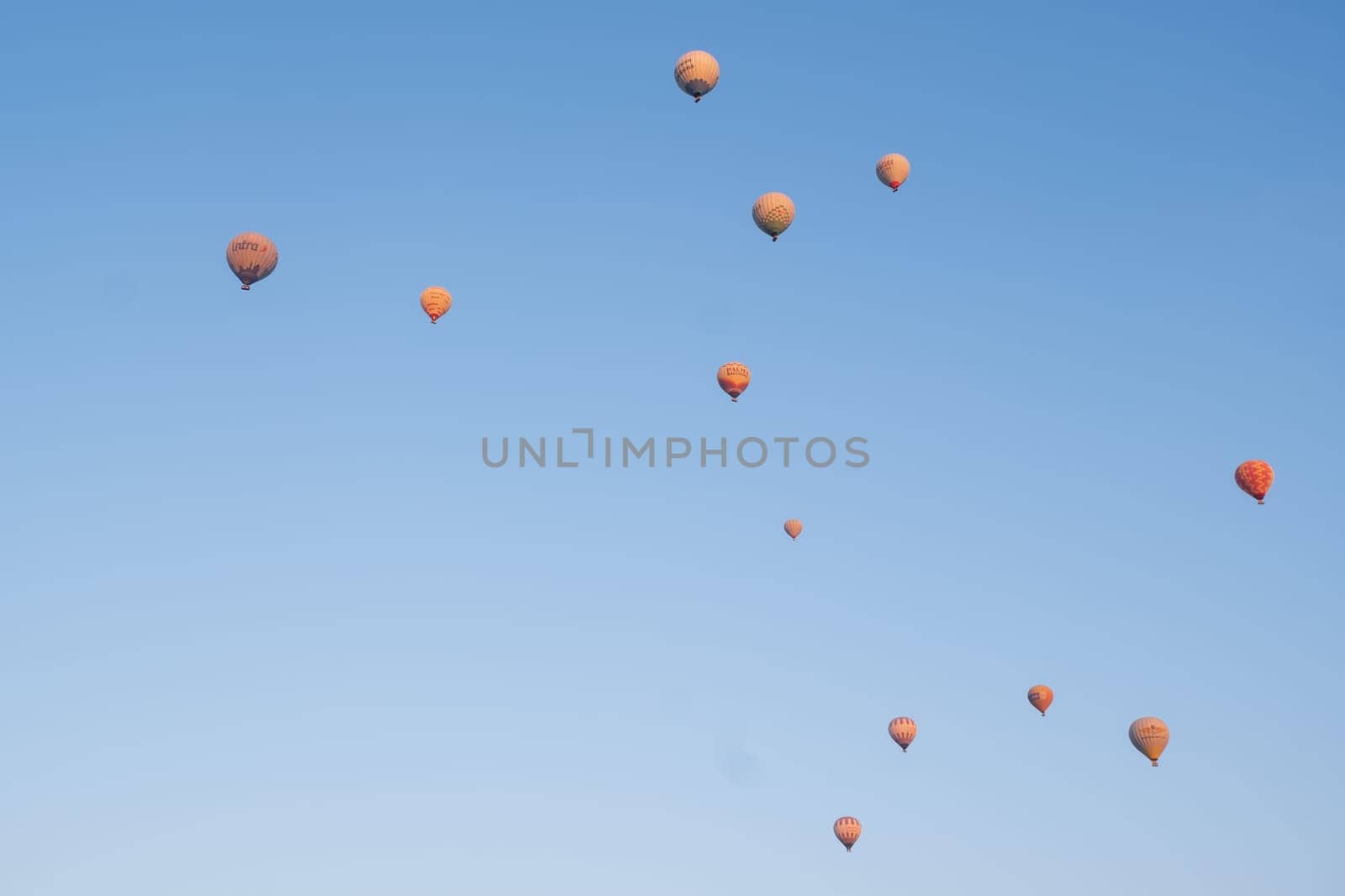 Pamukkale,Denizli,Turkey - October 15, 2023, hot air balloons flying over Pamukkale. High quality 4k footage
