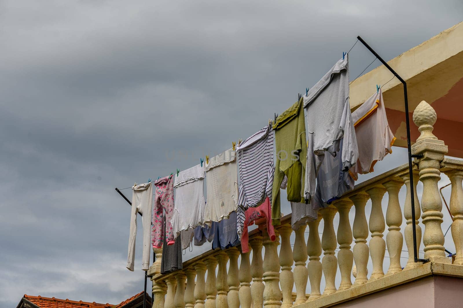 laundry drying on the balcony in winter in Cyprus 1 by Mixa74