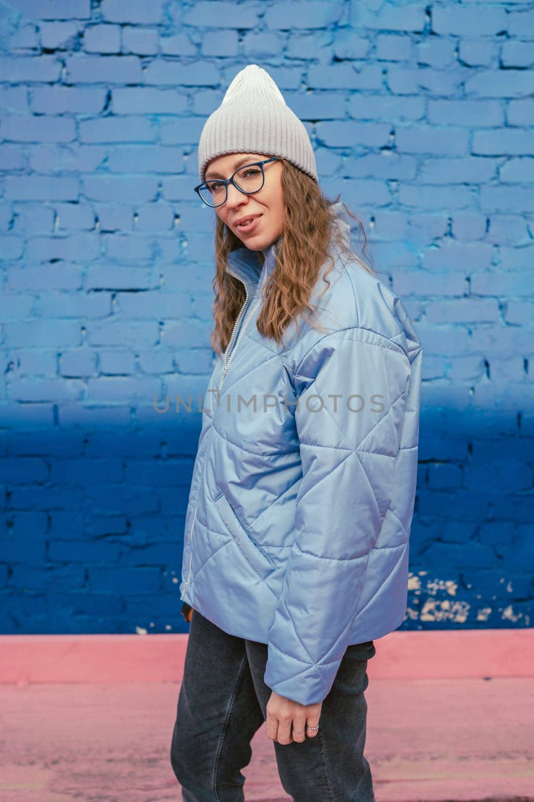 Portrait of a stylish woman in blue jacket by rusak