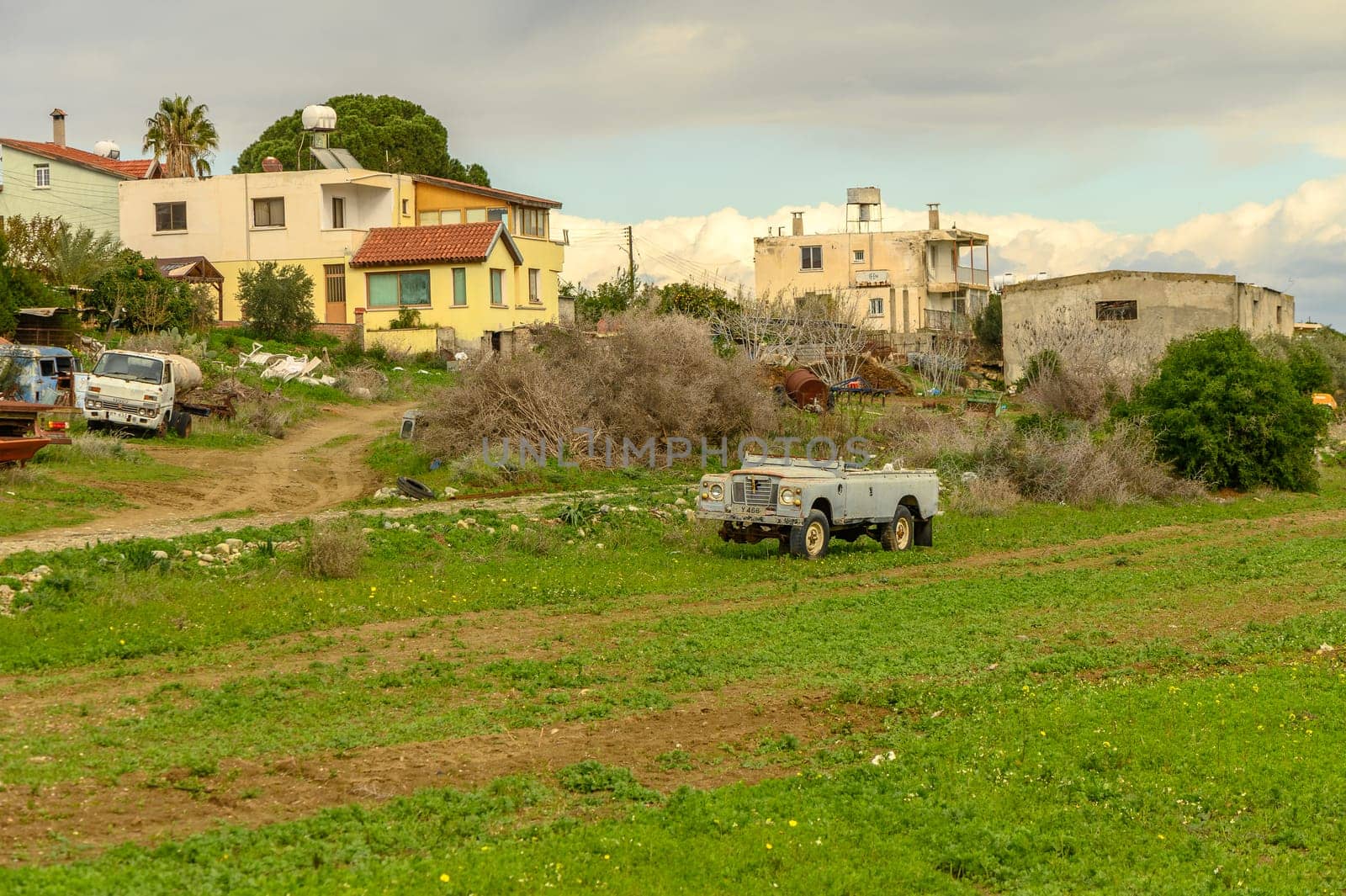 old landrover in a village in winter in cyprus
