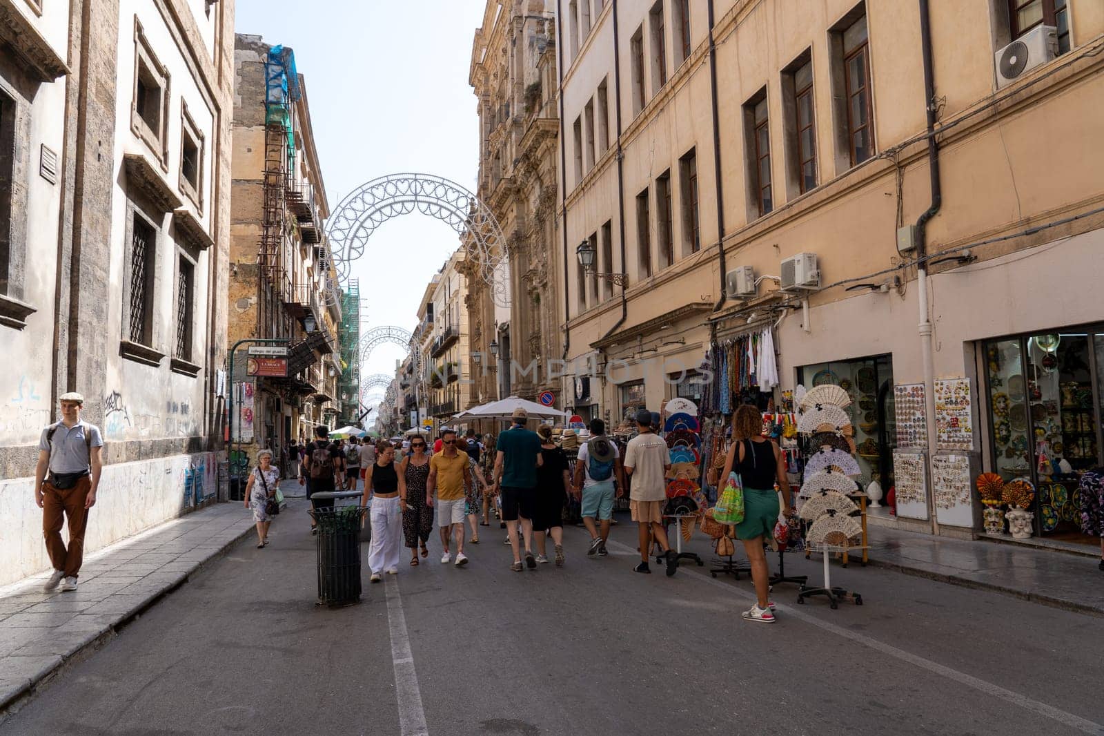 Palermo, Italy - July 20, 2023: People on a main pedestrian and shopping street in the historic city centre