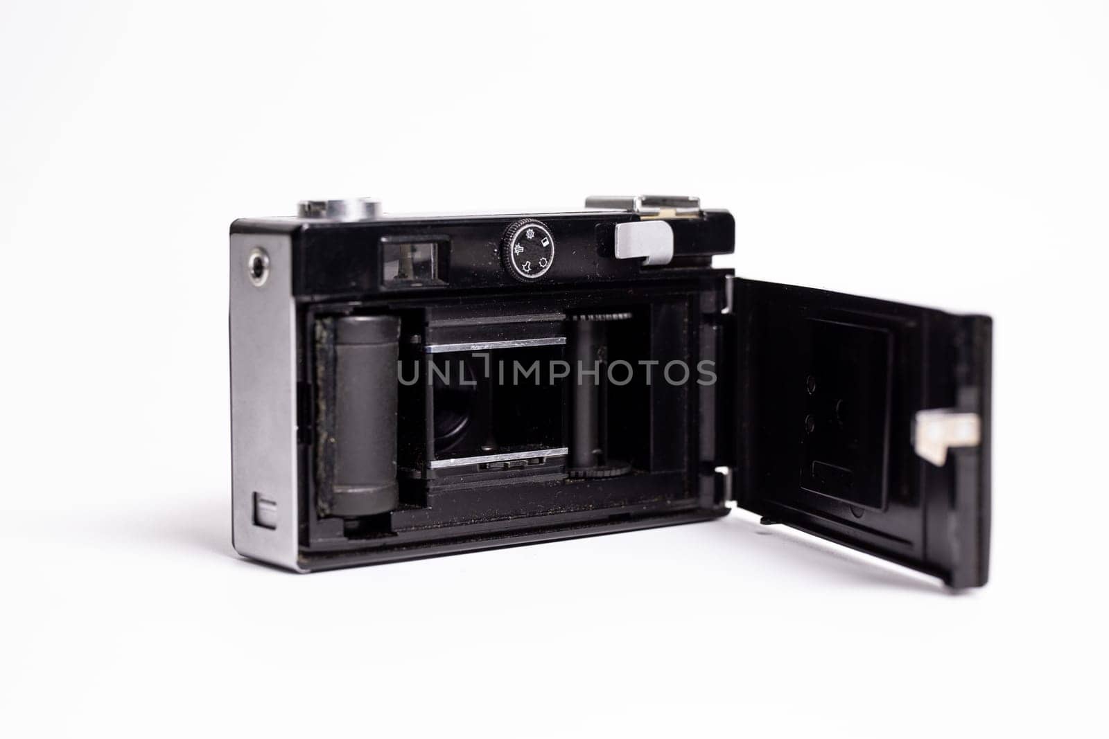 Black and silver retro camera with the back open isolated on a white background by Pukhovskiy