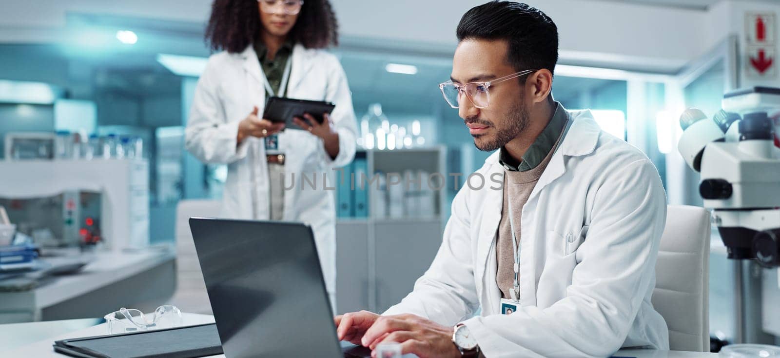 Science, teamwork and scientist with tablet in laboratory for communication, pharmaceutical review or planning. Employees, collaboration and technology for research, discussion and digital analysis by YuriArcurs