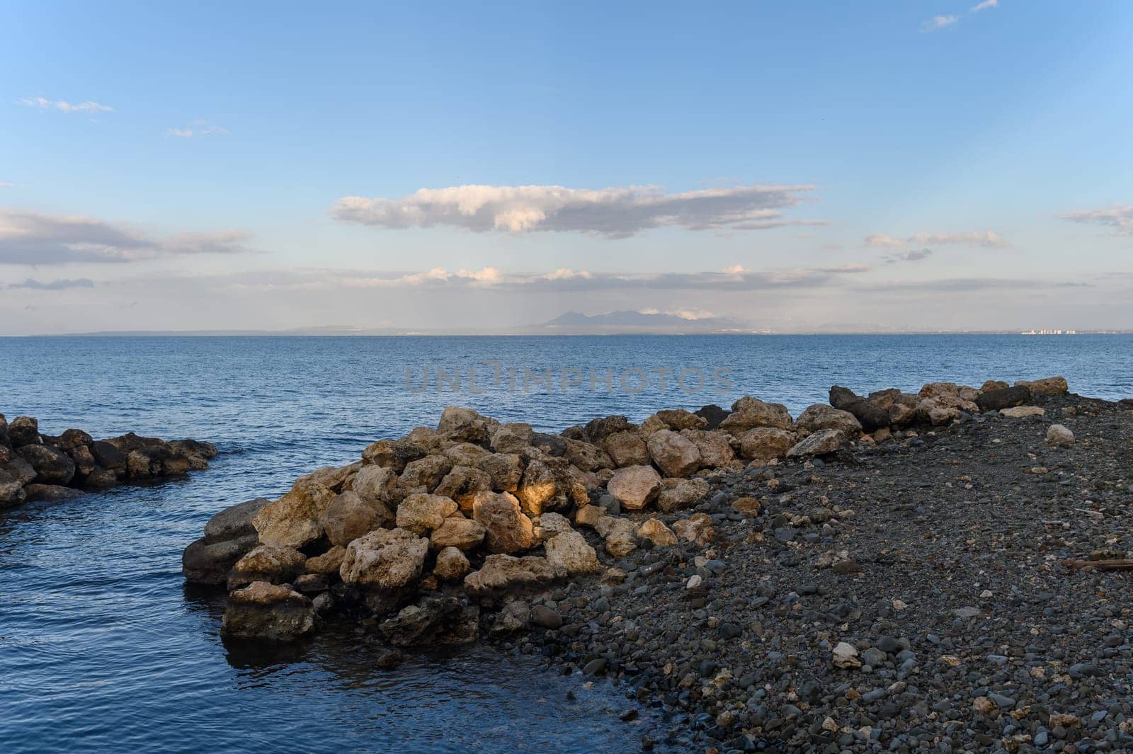 stones near the beach of the Mediterranean sea in Cyprus in winter