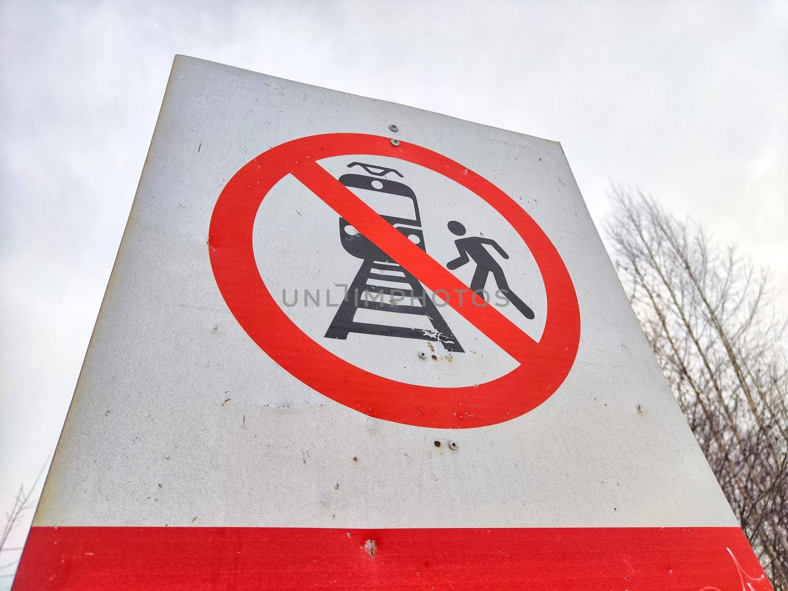 A sign not to walk on railway tracks. Railway Crossing Not Allowed or Walking on Railroad Prohibited. Russia