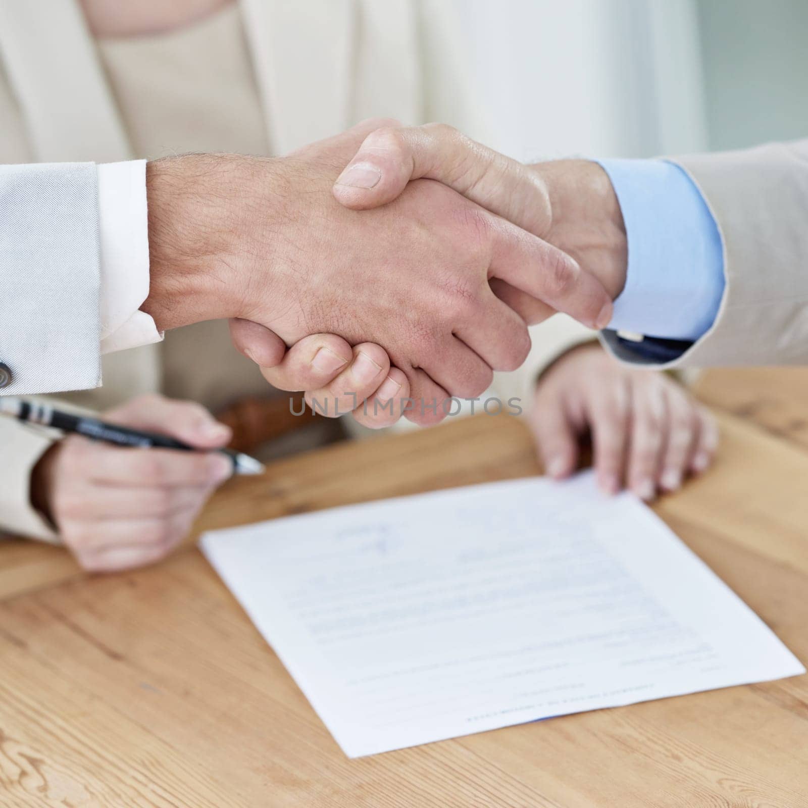 Shaking hands, business people and contract, onboarding closeup with human resources in meeting or interview . Paperwork, cooperation and partnership with signature, hiring and handshake for welcome.