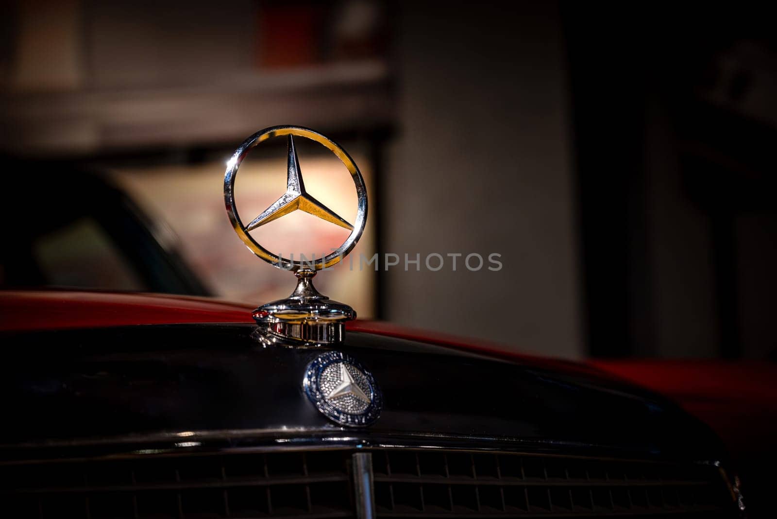 Antalya, Turkey - January 31, 2024: Original Mercedes-Benz E-Class logo standing on the front grille by Sonat