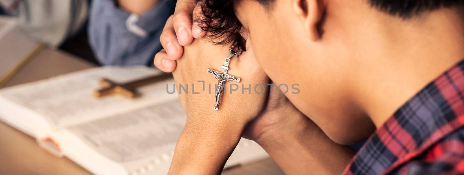 Group of christian pray to god while holding iron cross. Closeup. Burgeoning. by biancoblue