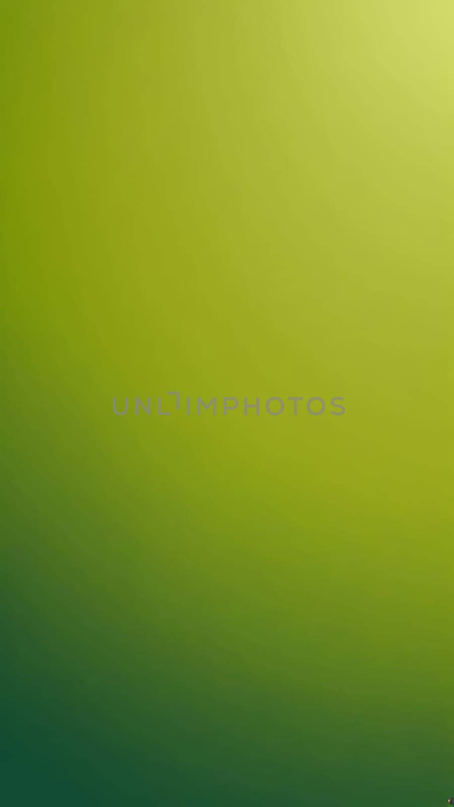 A gradient wallpaper with Ellipsoidal shapes using olive and darkolivegreen gradient colors. Generative AI.