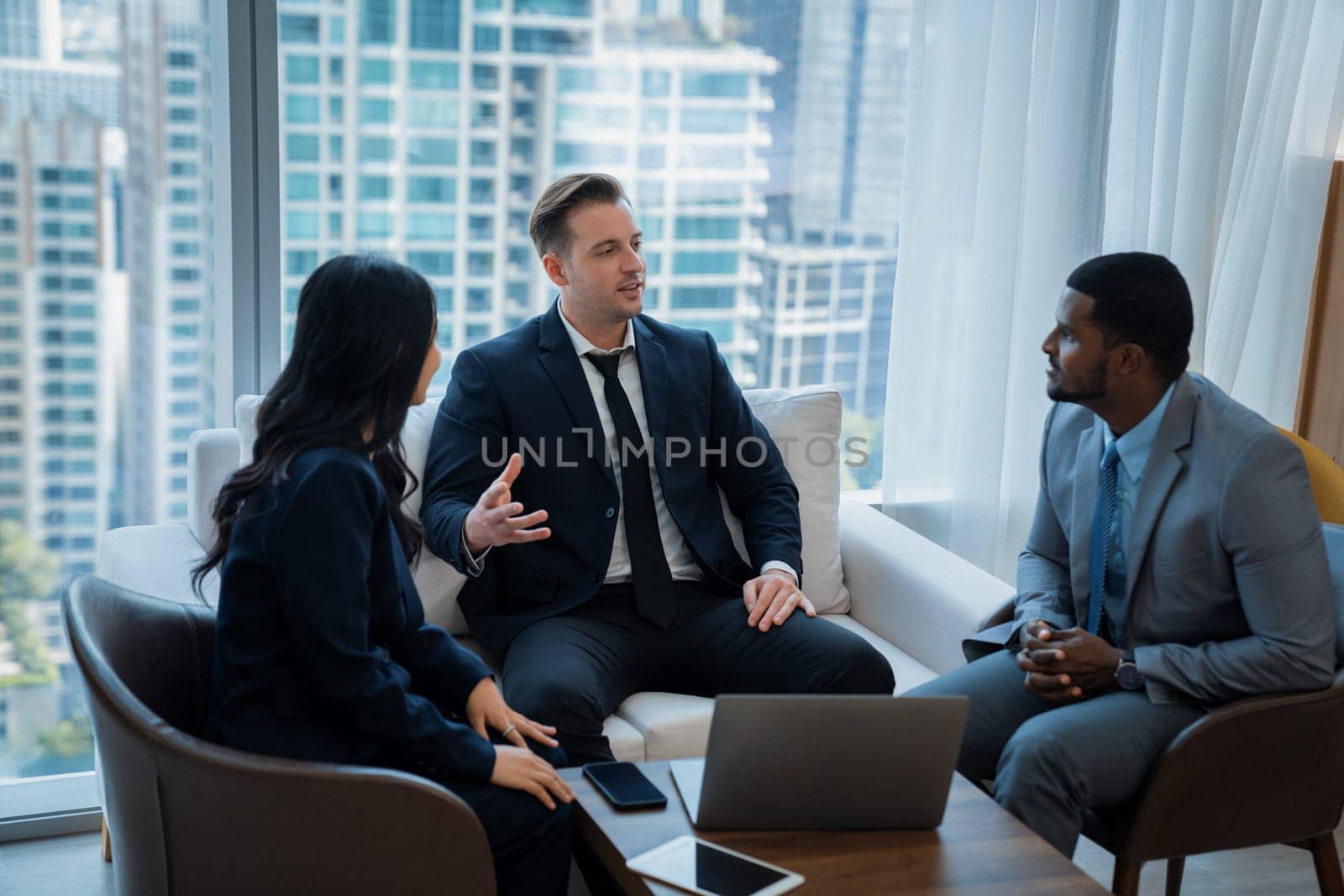 Group of diverse executive investor listening businessman talking about investment. Professional business team discussing about business plan, statistic, marketing strategy at office. Ornamented.