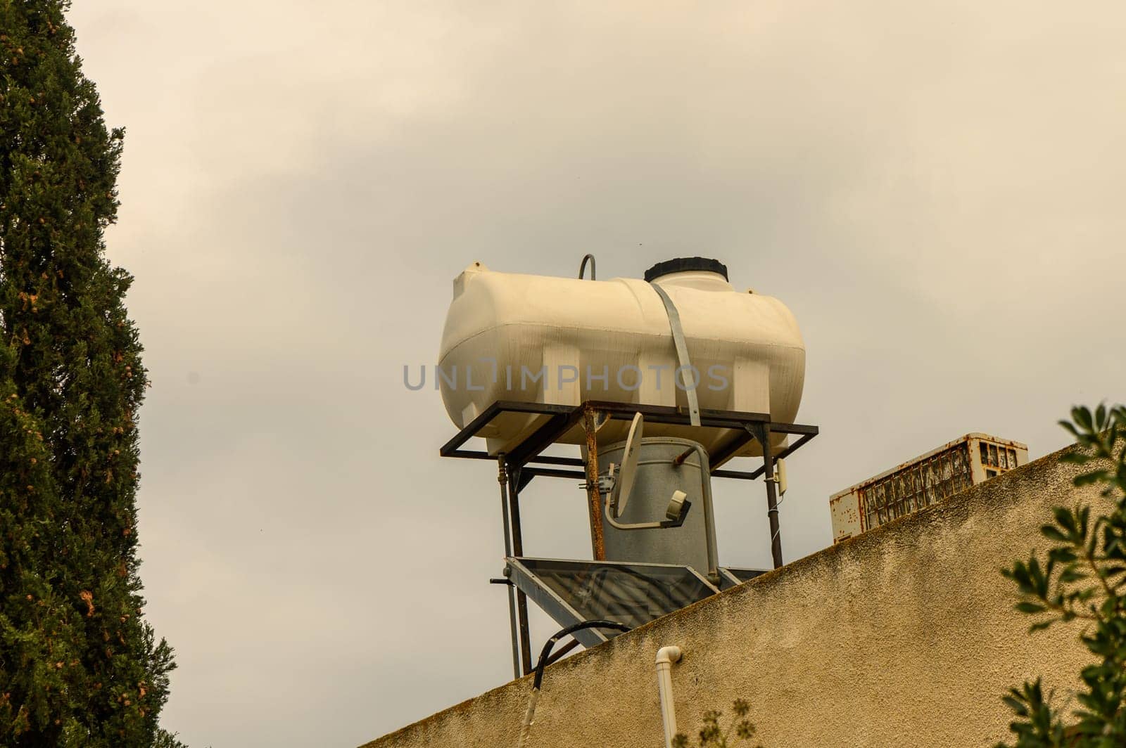 tank for heating water on the roof in a village in Cyprus 1 by Mixa74