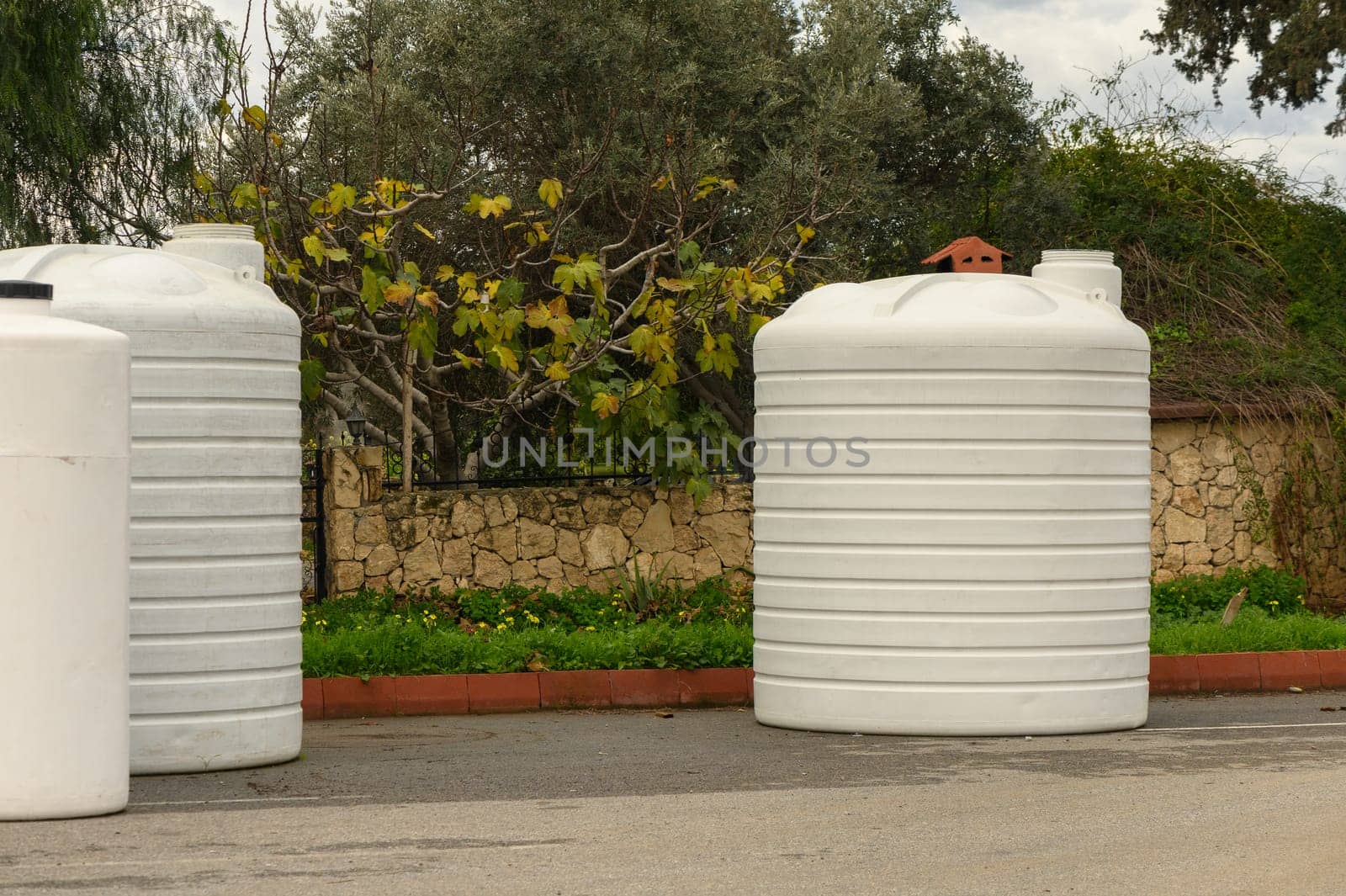 selling water tanks in a village in Cyprus 1